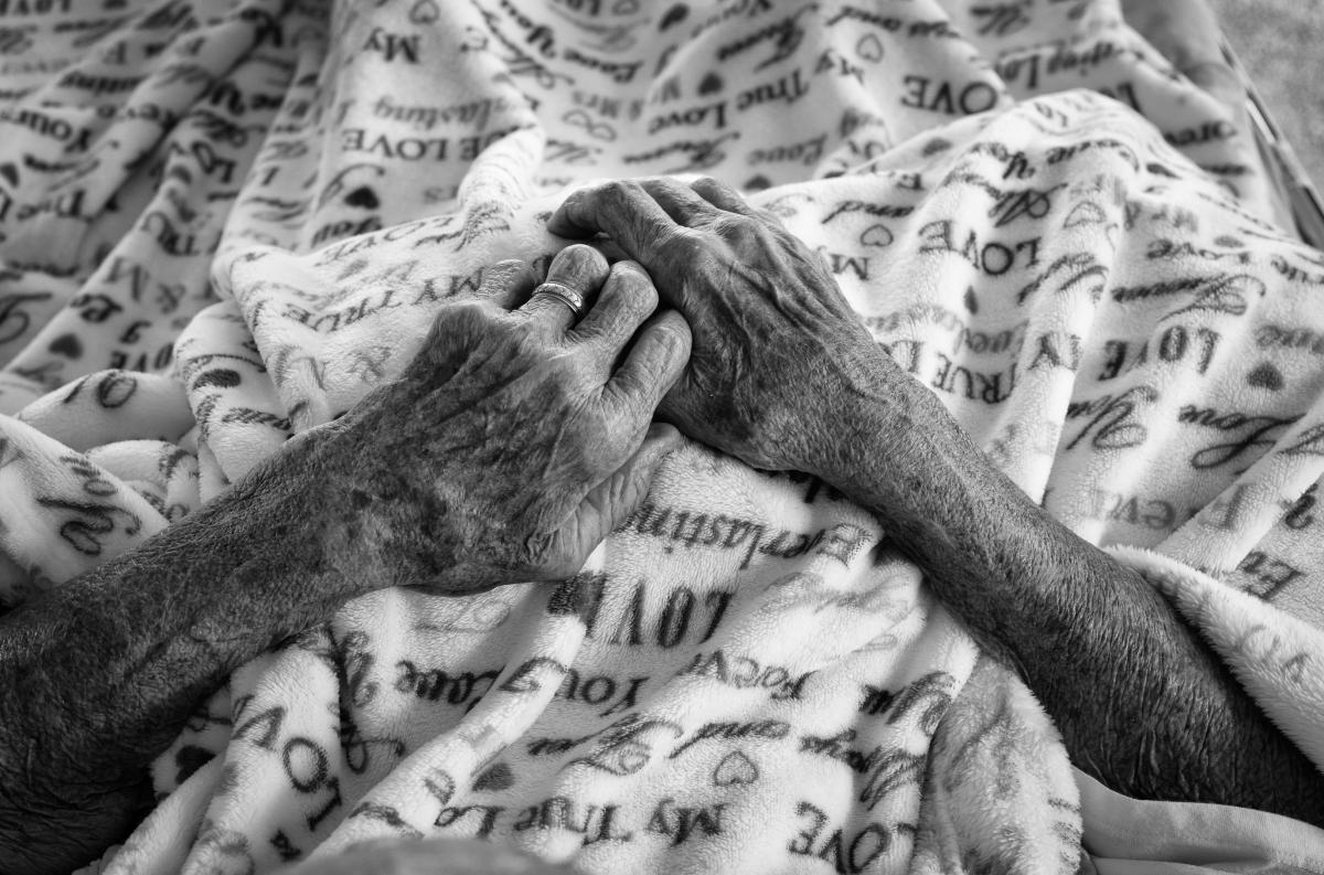 Joan's Hands that performed so many tasks, comforted so many, over a long lifetime.